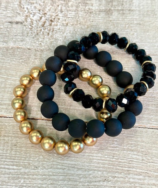 Set of Black and Gold Bracelets