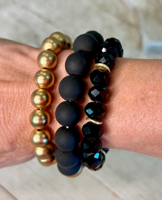 Set of Black and Gold Bracelets